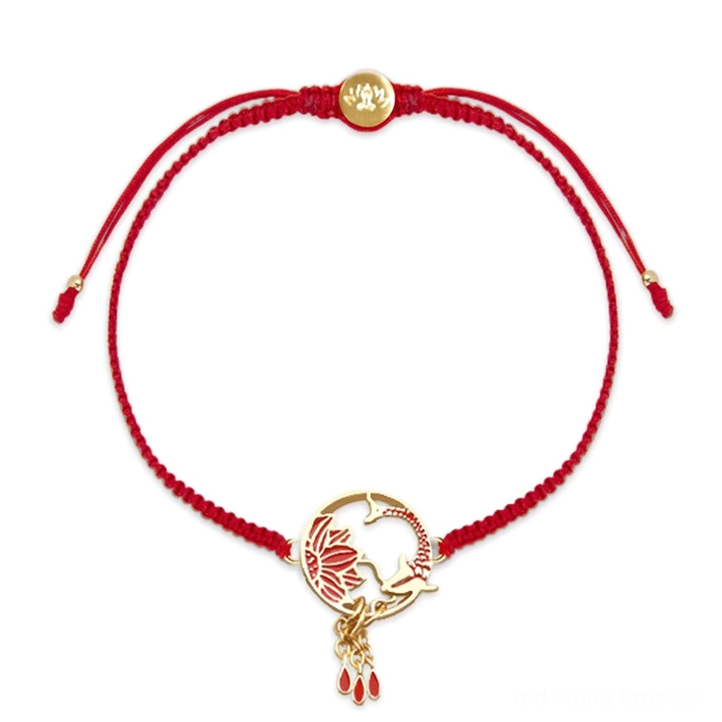 Tibetan lotus koi fish red string bracelet with gold charm on white background - front flat lay view