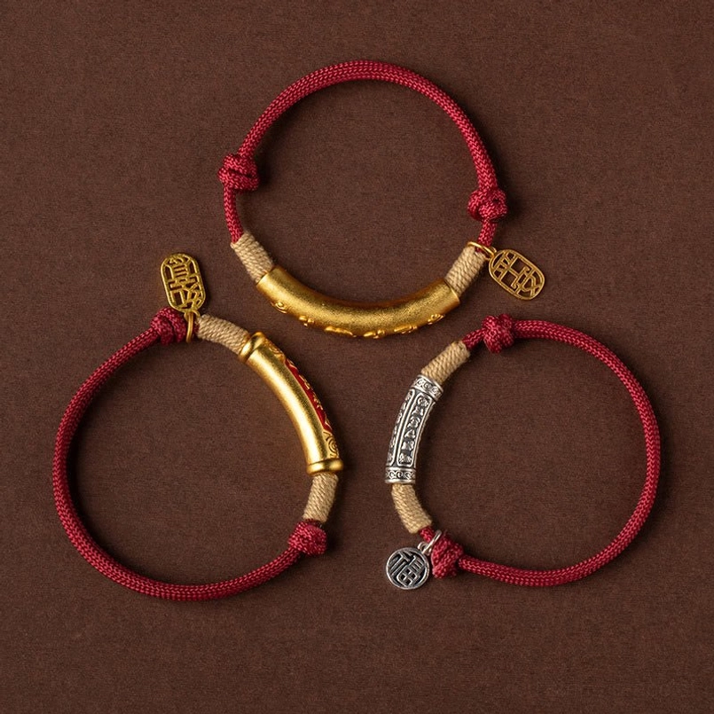 multiple tibetan red string bracelets with silver mantra tubes and fu character pendants collection