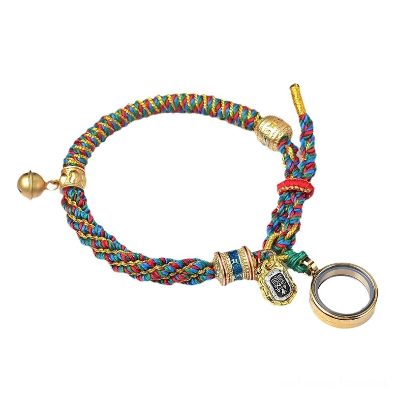 Tibetan amulet bracelet with round locket charm - red silk display background