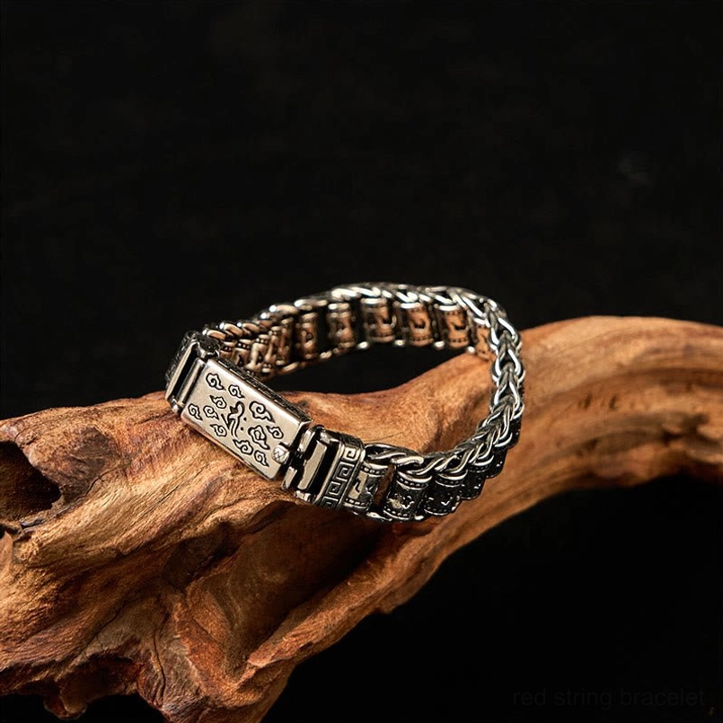 Sacred mantra copper bracelet three-quarter angle showing engraved details