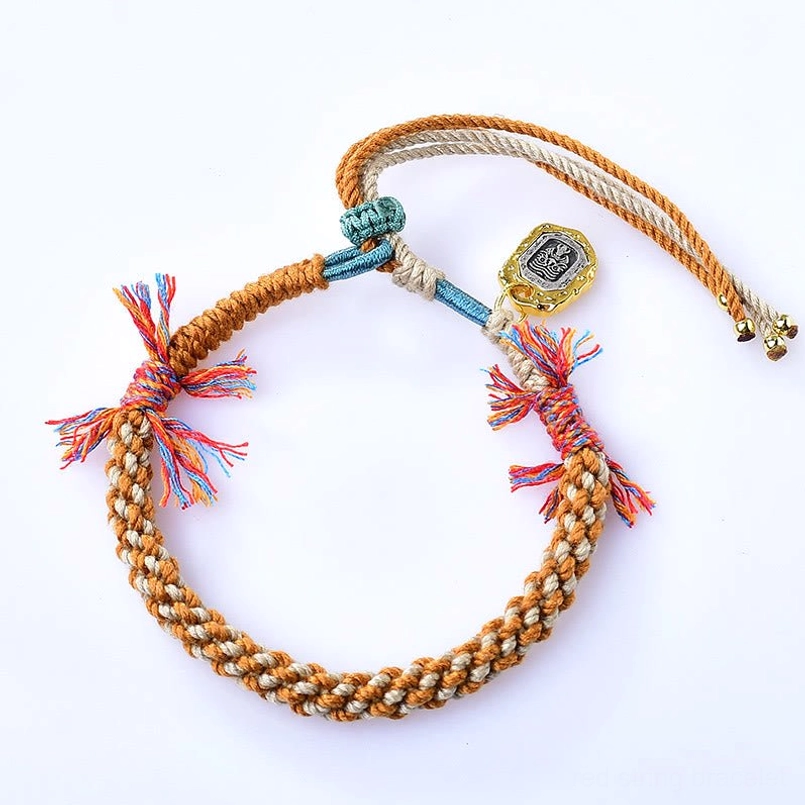 Tibetan prayer lucky string bracelet with sacred tassels top view