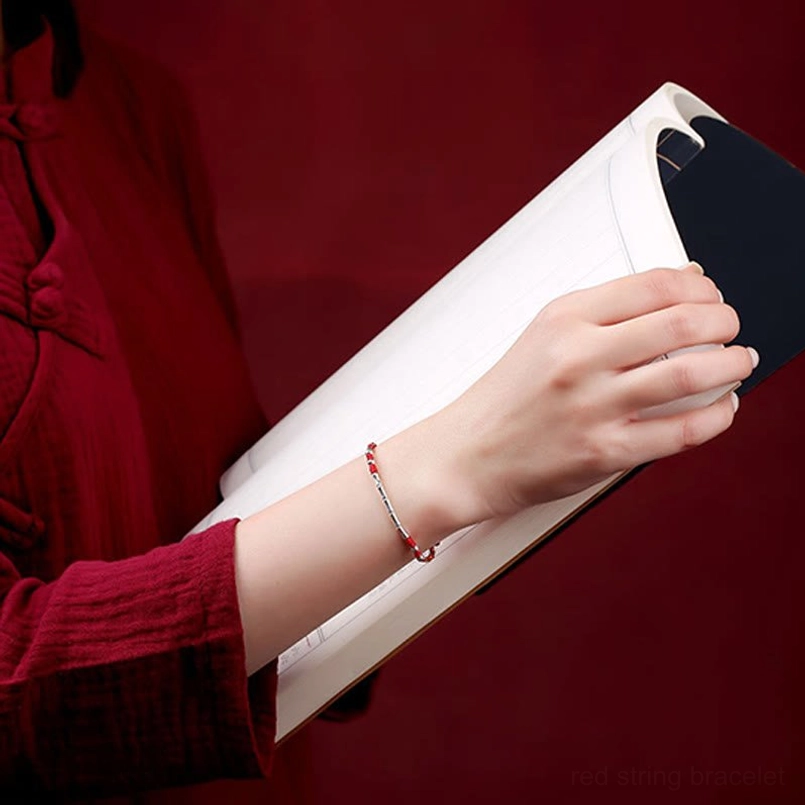 Woman wearing Tibetan bamboo protection bracelet on wrist, minimalist daily wear style