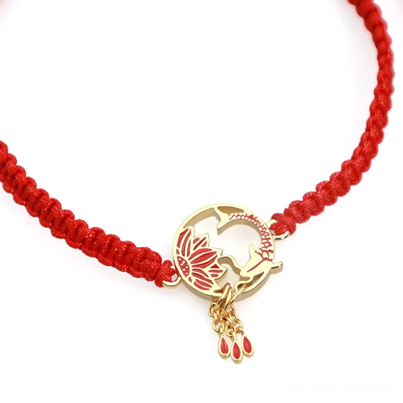 Tibetan handmade lotus koi fish red string bracelet - close-up side view with gold tassel