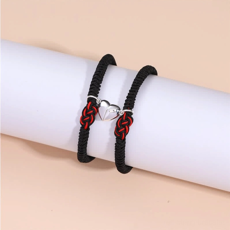 Tibetan protection red string bracelet representing thousands of years of Buddhist spiritual tradition