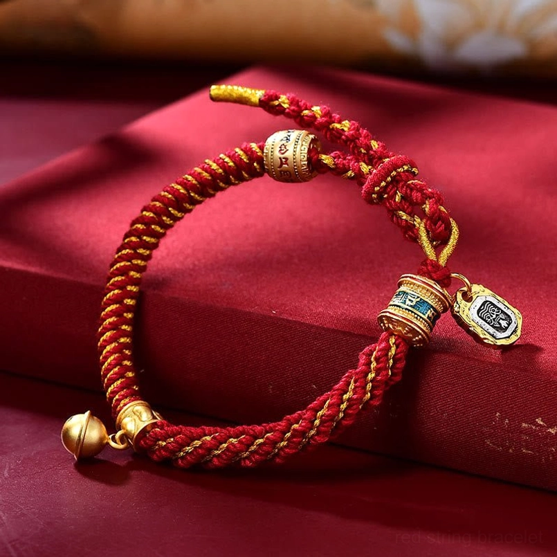 Red Tibetan Om Mani Padme Hum protection bracelet with gold metal charms and square tag pendant