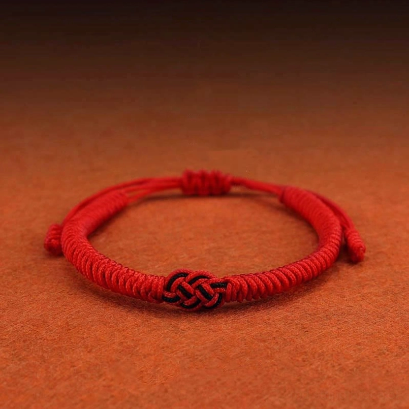 Tibetan red string bracelet pair showcasing authentic handmade craftsmanship and quality materials