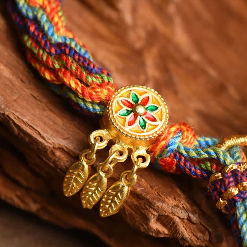 Tibetan lucky red string bracelet detail shot of woven reincarnation knot