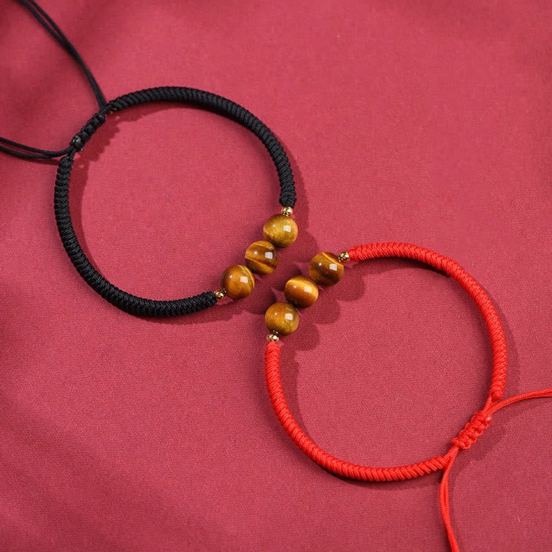 Tiger eye red string bracelet gift presentation showing luxury handmade packaging style