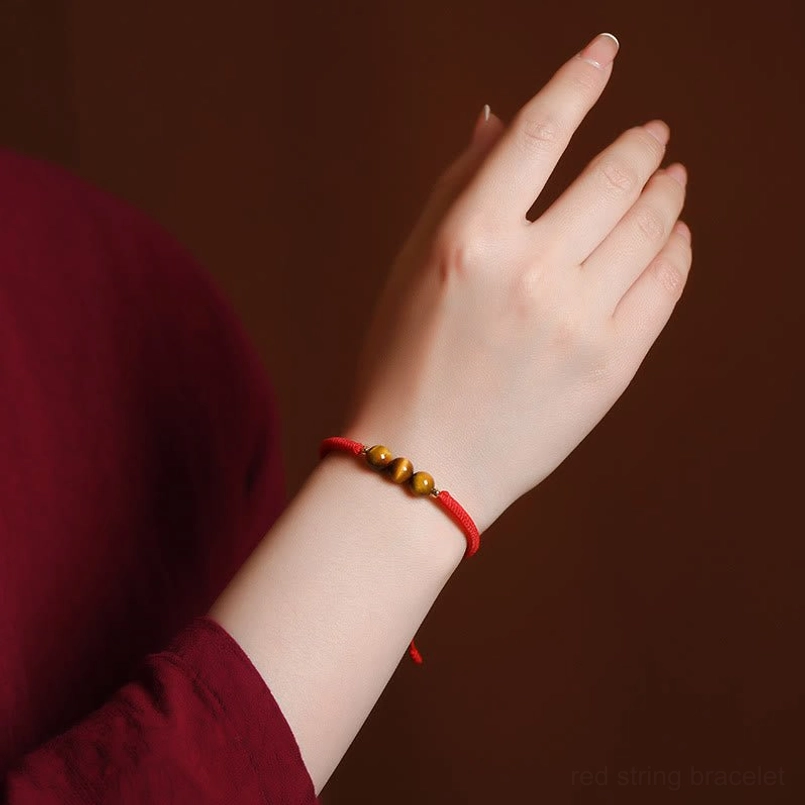 Handmade tiger eye protection bracelet showing craftsmanship and natural material quality