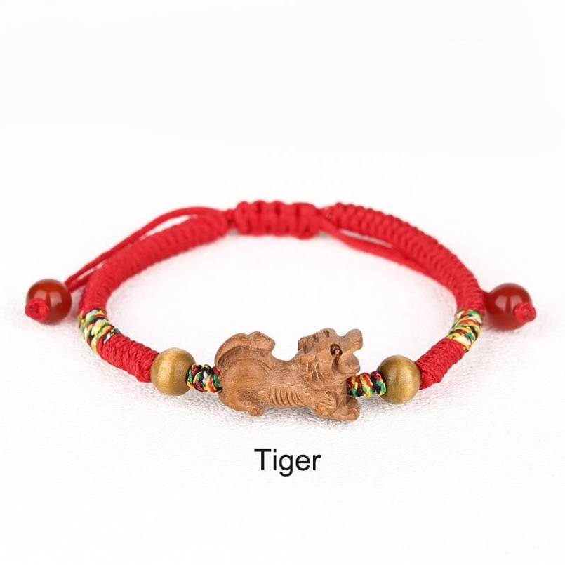 Tiger zodiac red string bracelet natural peach wood
