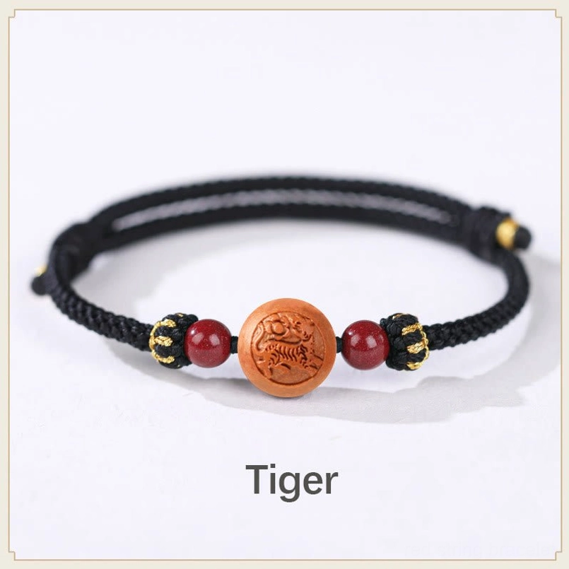 Tiger zodiac peach wood bracelet black rope - fierce and passionate Chinese zodiac amulet