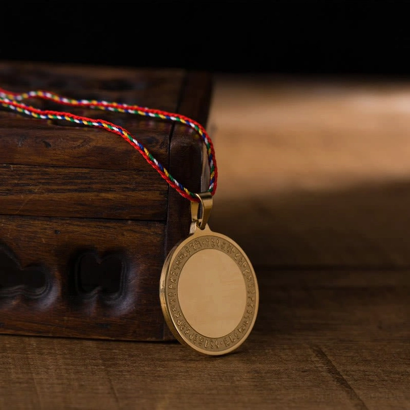 Titanium steel blank round pendant with multicolored braided rope necklace overhead view
