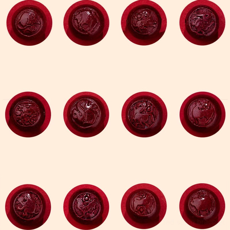 Complete set of 12 natural cinnabar zodiac animal pendants with carved motifs