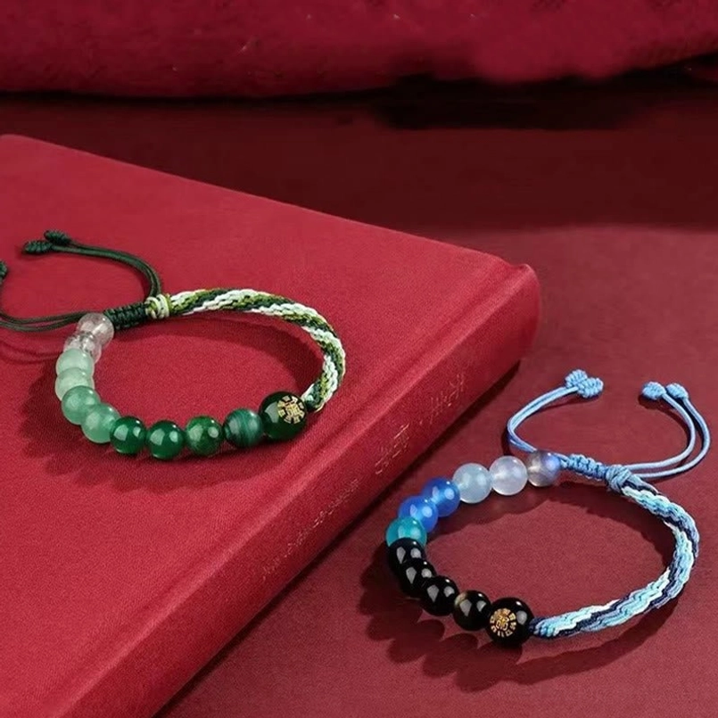 Two braided fortune bracelets with crystal agate beads and reincarnation knot closure