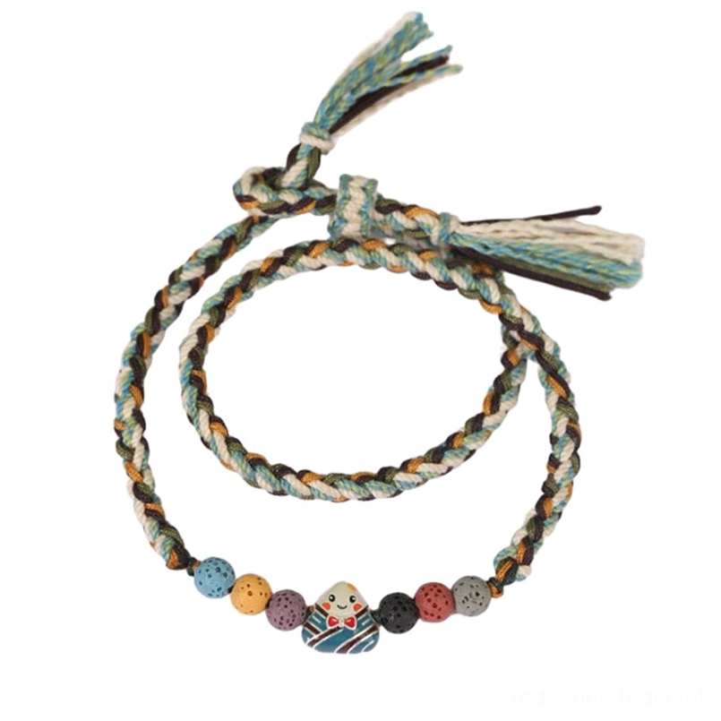 Two piece Dragon Boat Festival braided lucky bracelet set flat lay