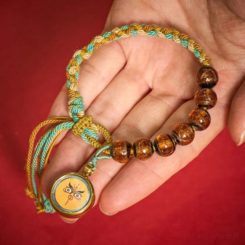 Five Directions Wealth God Buddha Eye bracelet full product view with adjustable knot
