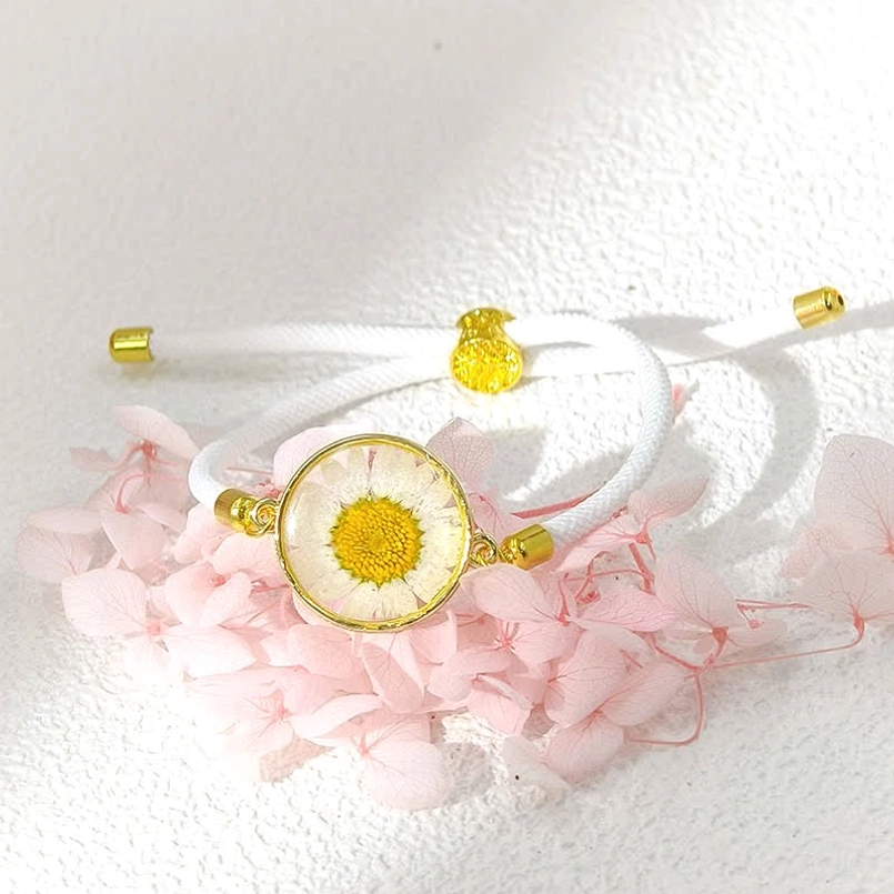 White braided rope birth flower bracelet with white daisy resin-pressed flower charm