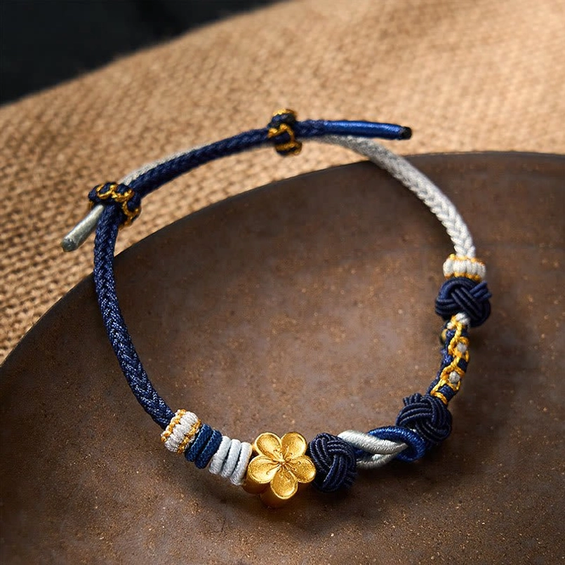Wine red Chinese knot couple bracelet with protective charm and traditional hand-woven design