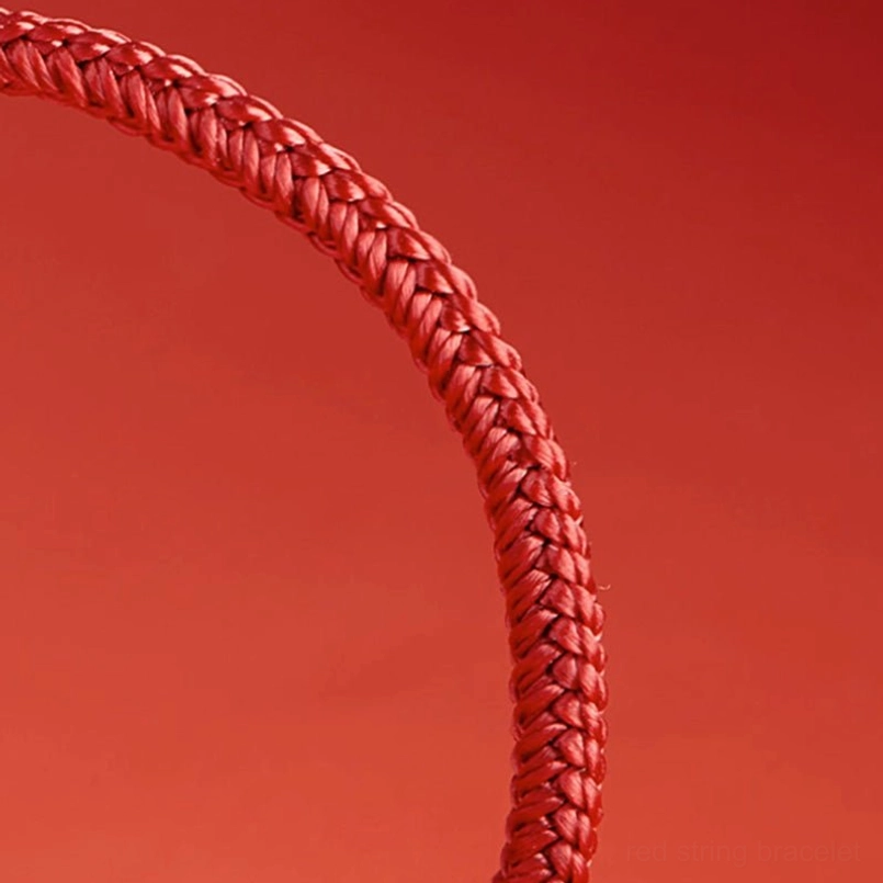 Premium woven red string texture close-up 925 sterling silver bracelet