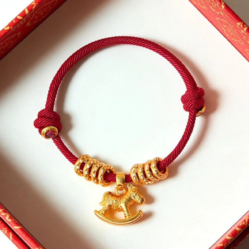 Year of the horse red string bracelet placed in red gift box packaging