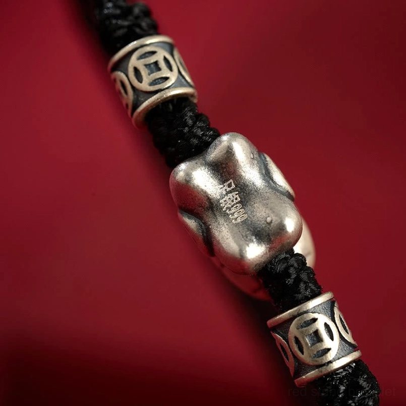 Gift packaging shot of year of horse lucky red string bracelet