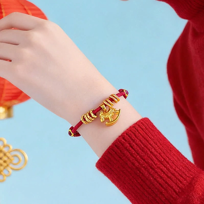 Multiple color options of year of the horse red string bracelet displayed side by side