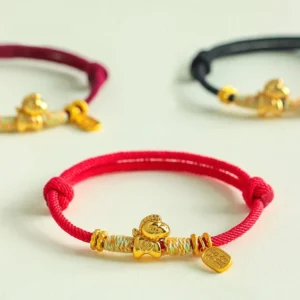 Year of the Horse zodiac fortune charm red black string bracelets plain gray background