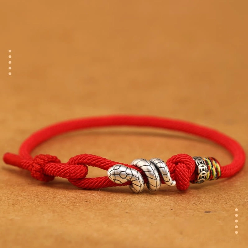 Year of the Snake 2025 red string bracelet with silver snake charm, available in multiple wrist sizes