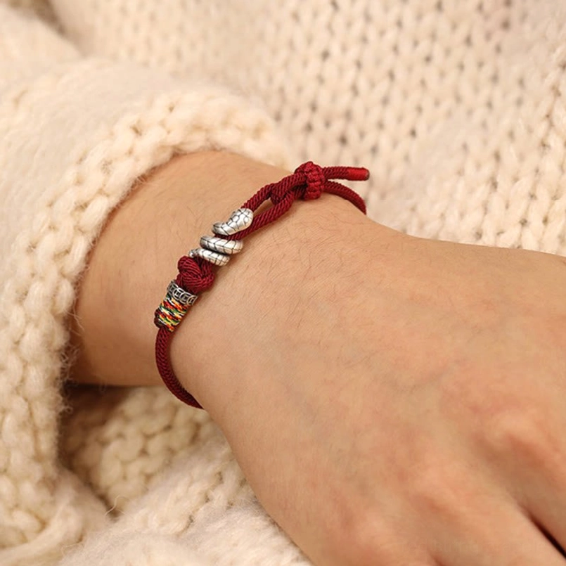 Handcrafted Year of the Snake red string bracelet in burgundy with 925 sterling silver snake charm