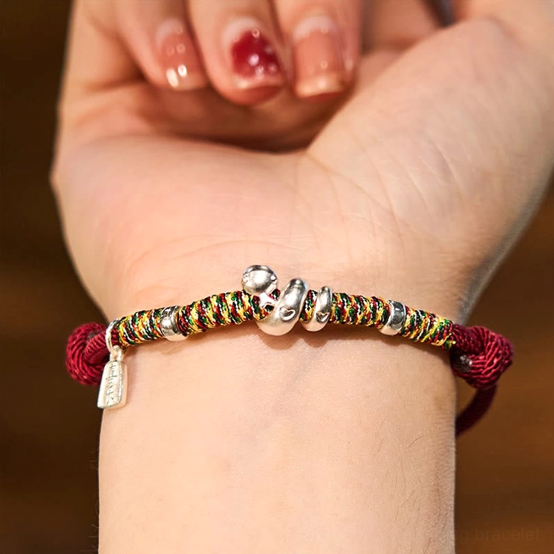 999 Sterling Silver Year of Snake Red String Bracelet worn on human wrist