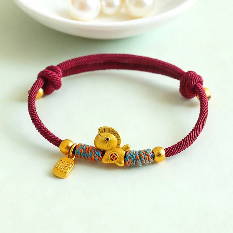 year of the horse lucky red string bracelet with fu tag in pearl decorated white bowl