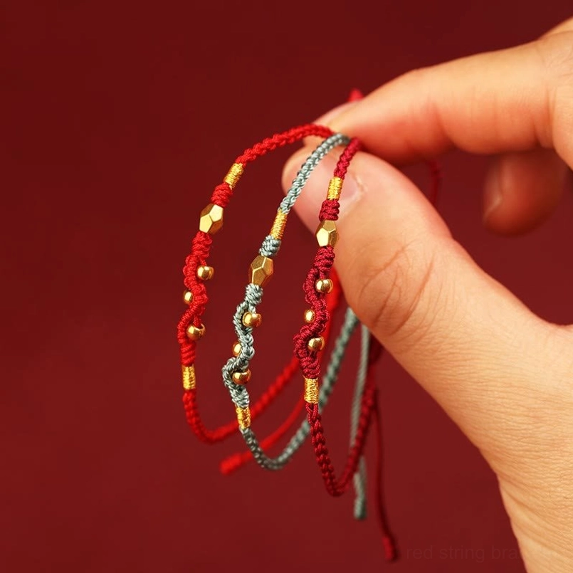 Year of the snake 999 gold red string bracelet packaging display