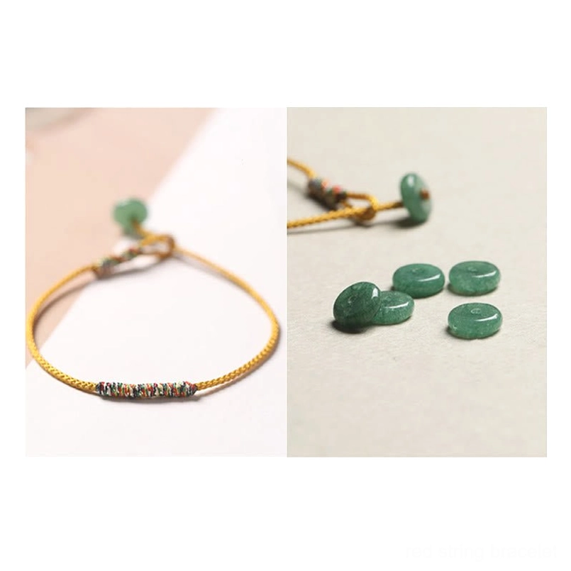 Yellow braided Tibetan bracelet displayed with loose green aventurine beads flat lay composition