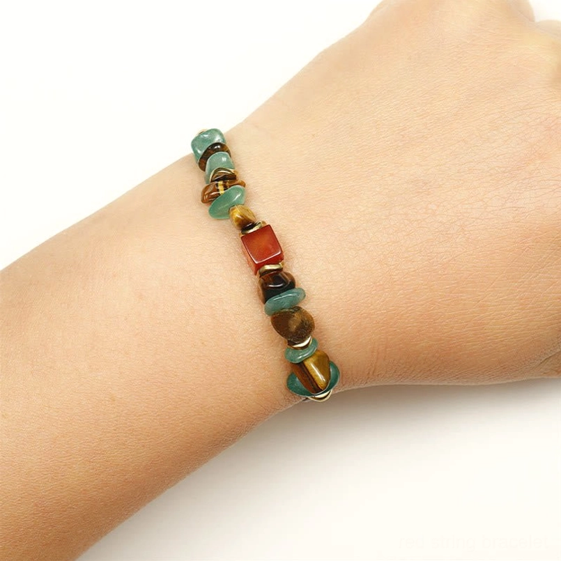 Green aventurine tiger eye carnelian bracelet worn on slim wrist showing fit