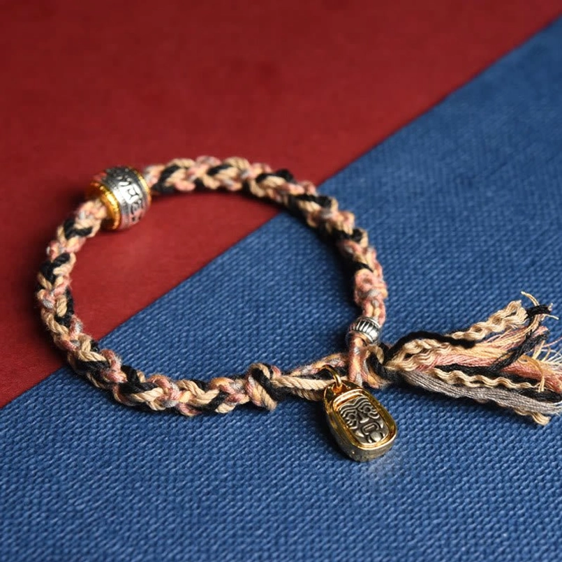 Pink beige black Zakiram goddess bracelet with copper spacer bead and retro charm pendant