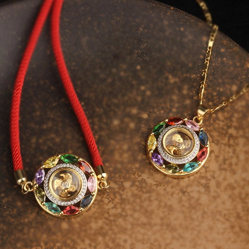 Red string bracelet and multicolor zircon copper necklace set displayed together on brown background