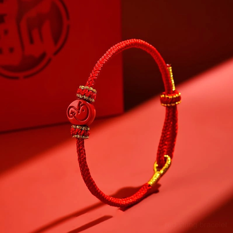 Chinese zodiac protection bracelet three-quarter side view with gold thread detailing