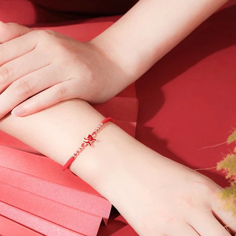 Chinese Zodiac Dragon red string bracelet with sterling silver dragon charm and protective red cord