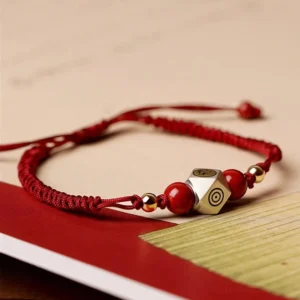 Handmade red zodiac natal Buddha cinnabar bracelet with sterling silver polygonal charm and beads