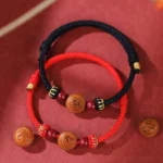 Chinese zodiac peach wood Fu bracelet collection - complete set featuring all 12 zodiac animals with red and black braided rope