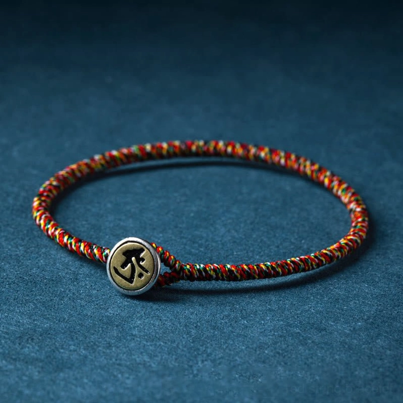 Chinese zodiac natal Buddha protection bracelet flat lay product photography with display accessories