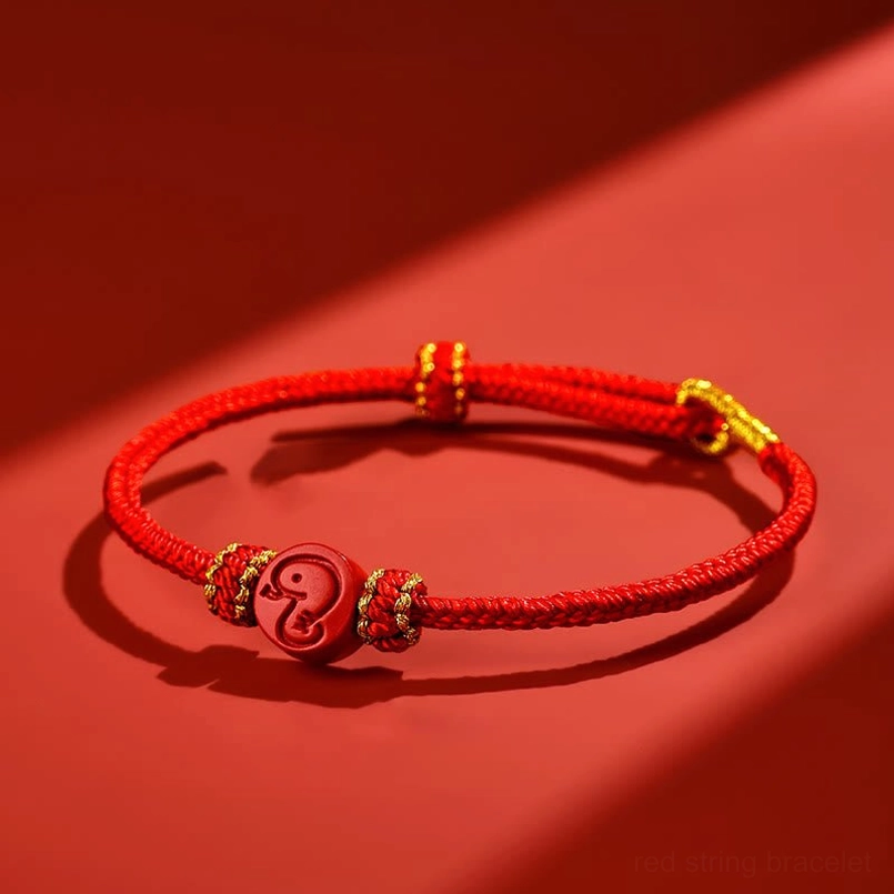 Red rope zodiac bracelet with eight thread peace knot, cinnabar snake pendant and gold accents