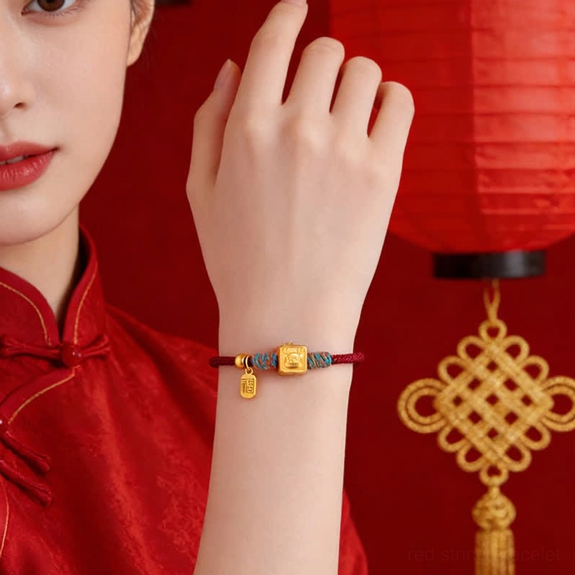Red and black zodiac string bracelet comparison showing color and design variations